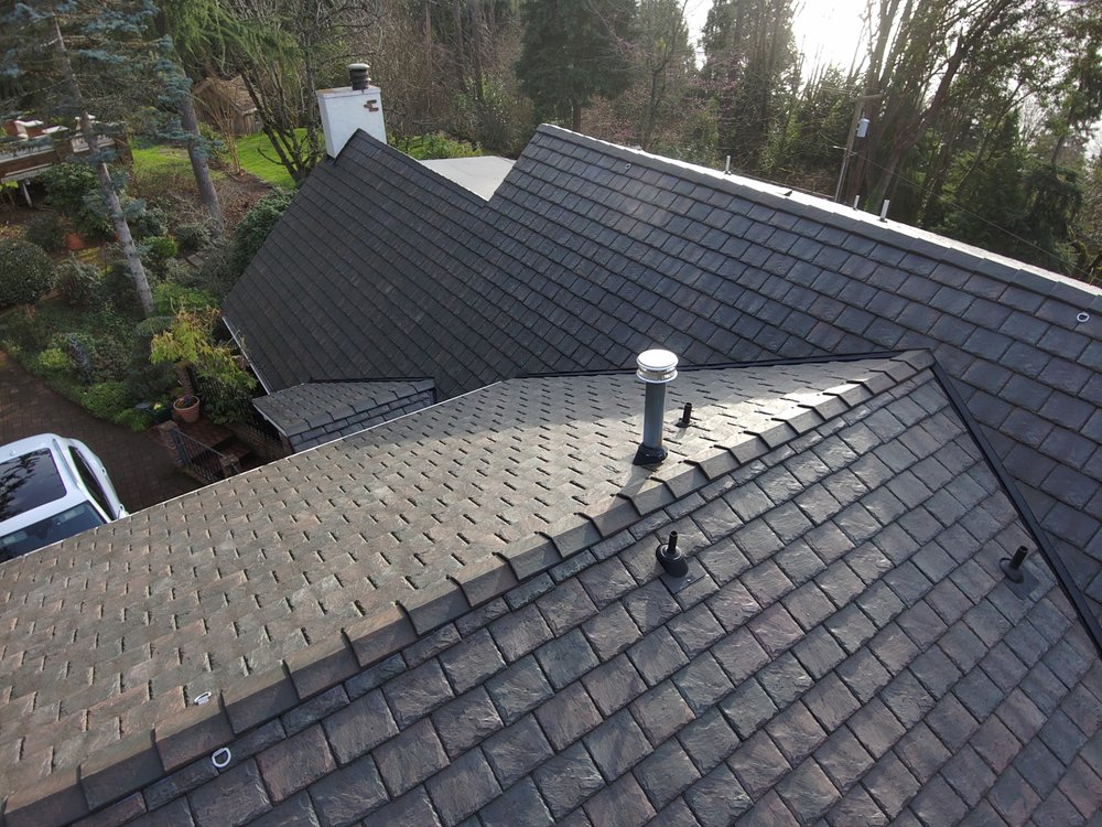 Durable Brava tile roof installation.

