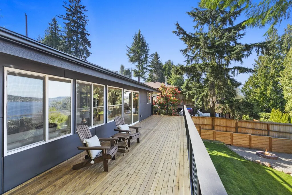 Cedar deck replacement with cable railing— Orca Roofing & Exteriors