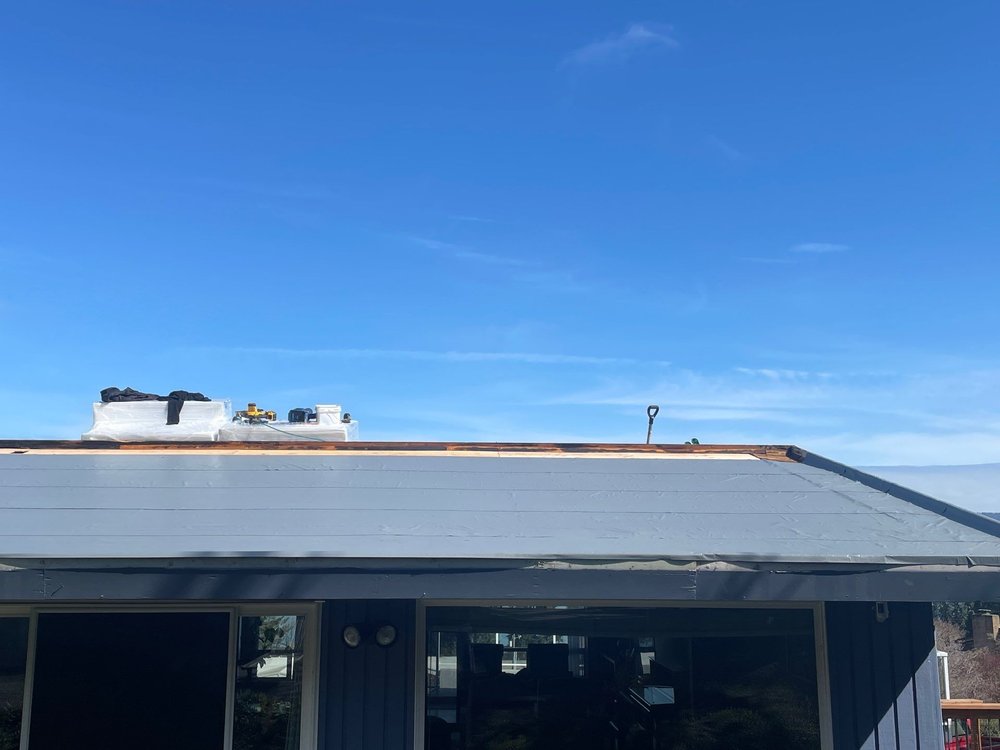 Bellevue building with a reliable flat roof system.

