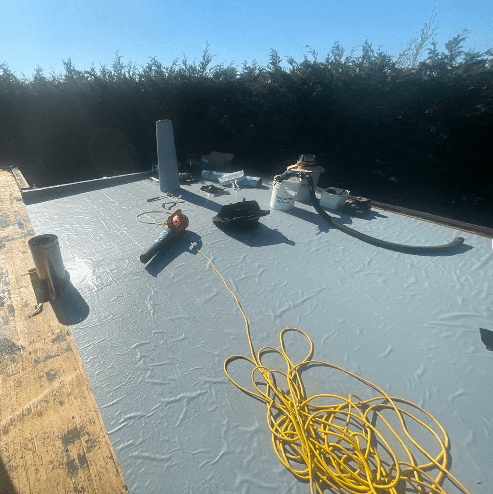 Flat roof replacement project in Kirkland by Orca Roofing & Exteriors.

