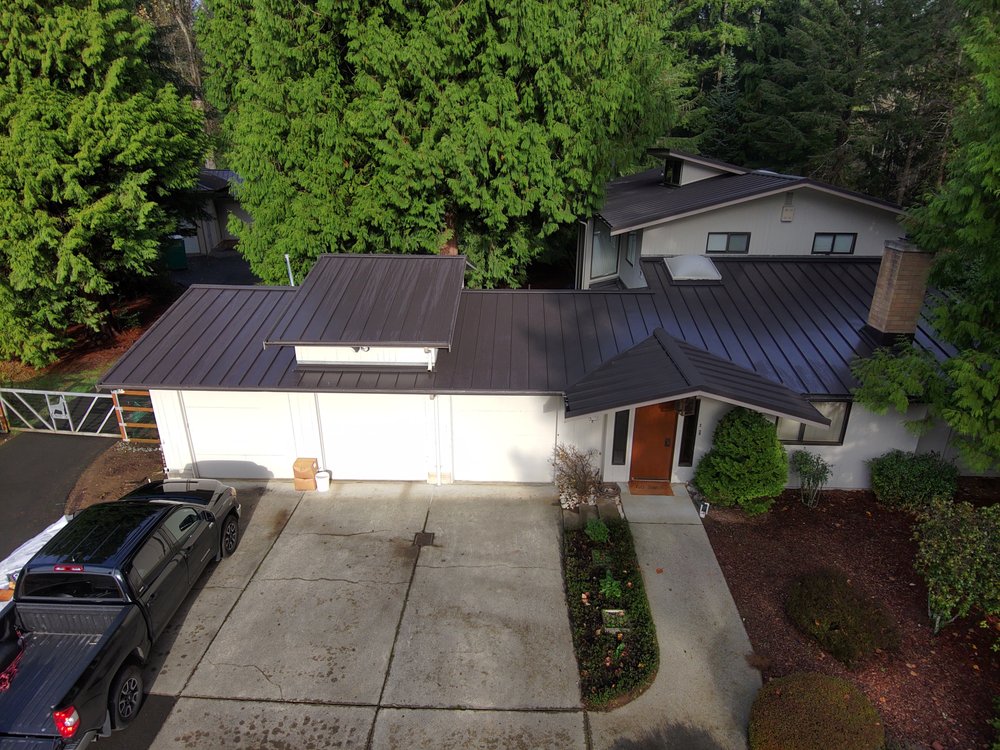 Bellevue residence with a stylish and durable Nuray Metal roof by Orca Roofing & Exteriors.

