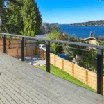 New composite deck installation on a rainy day in the Pacific Northwest