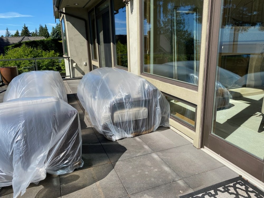 Removing dirt and grime from an asphalt shingle roof in Edmonds.

