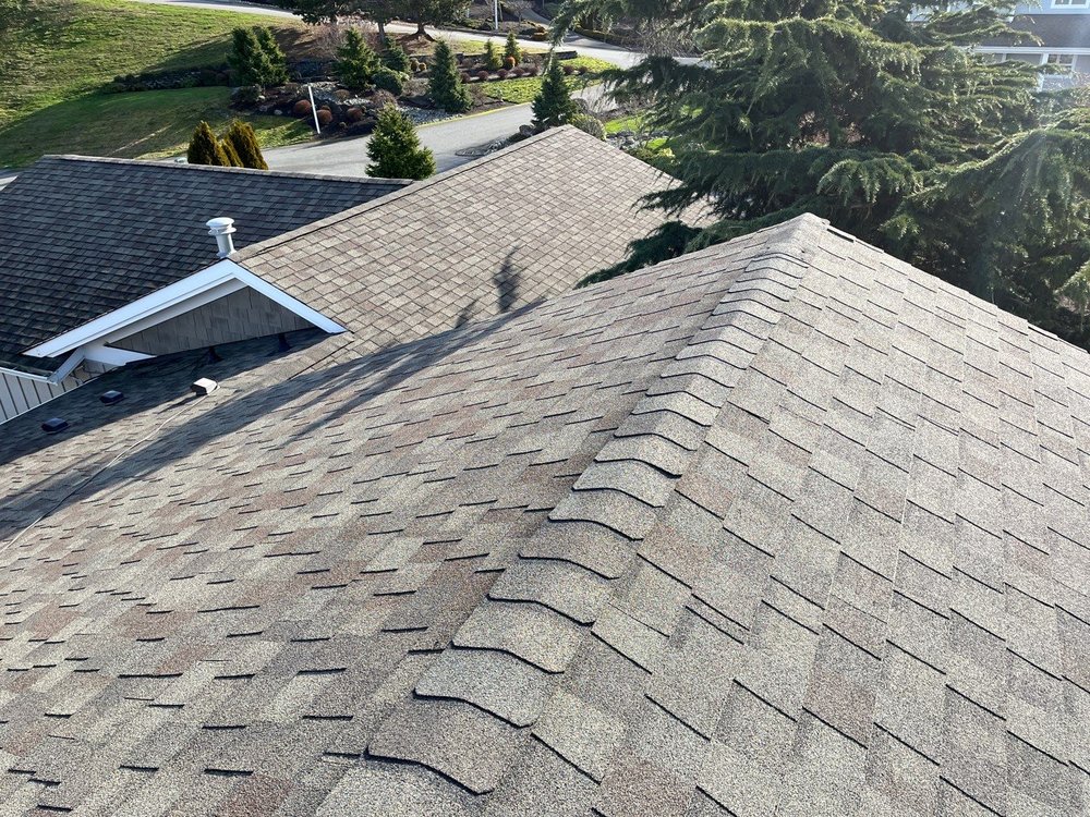 Camano Island home with a durable asphalt shingle roof.

