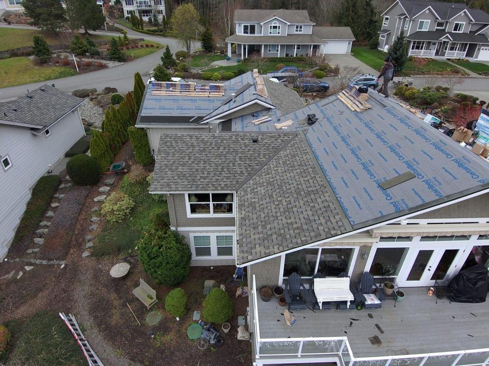Expert asphalt shingle roof installation on Camano Island.

