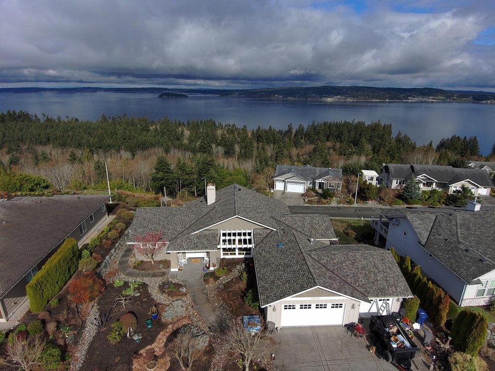 Professional asphalt shingle roof replacement service for Camano Island.

