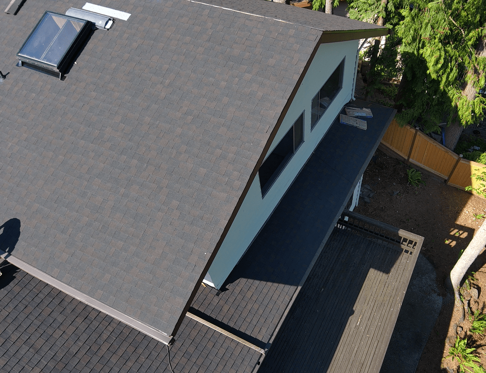 Shingle roof replacement in Mercer Island, WA by Orca Roofing & Exteriors.

