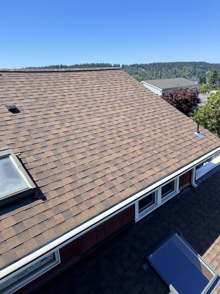 Shingle roof replacement in Renton, WA by Orca Roofing & Exteriors.

