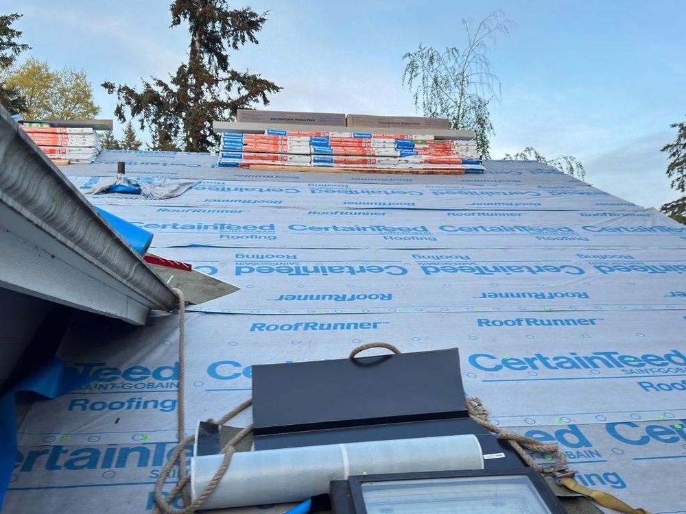 Complete roofing upgrade in Bothell with CertainTeed shingles, skylight, and gutters.

