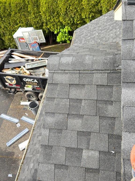 Reliable gutter system protecting a home with Northgate shingles in Bothell.

