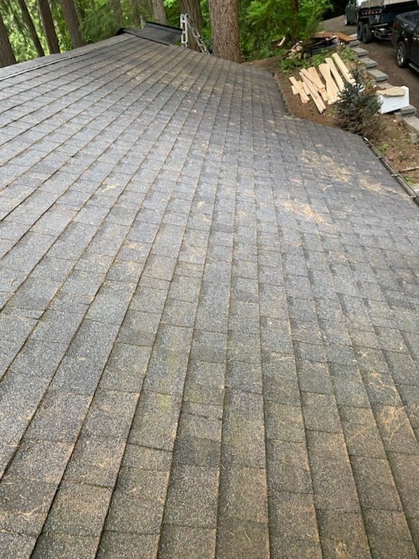 Enhanced home brightness with clean roof and skylights in Woodinville.