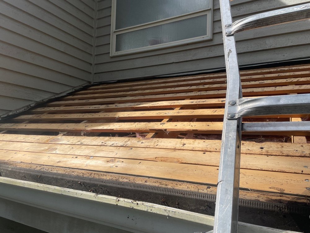 PVC flat roof upgrade by Orca Roofing & Exteriors.