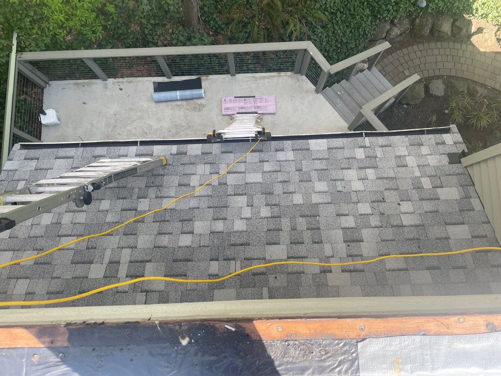 Customized roof solution with mixed materials by Orca Roofing in Seattle.