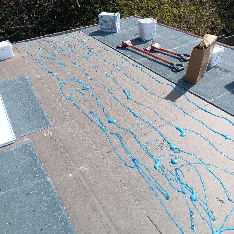New PVC flat roof replacing old Torch Down in Seattle.

