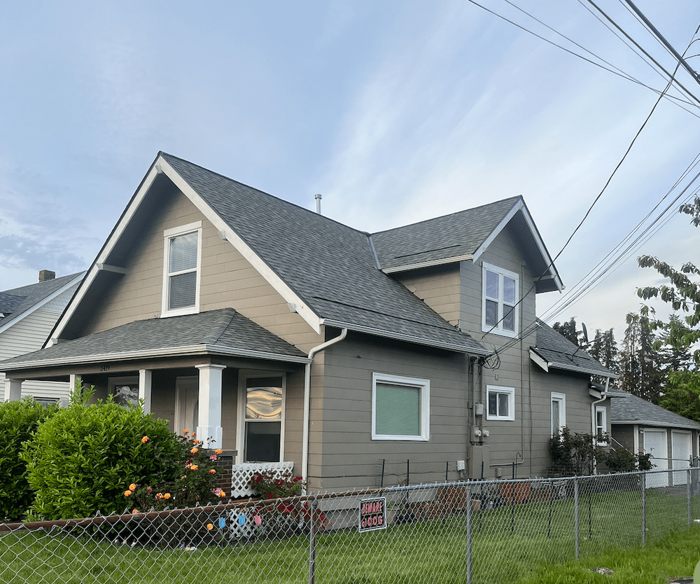 Shingle roof replacement project in Tacoma, WA by Orca Roofing & Exteriors.
