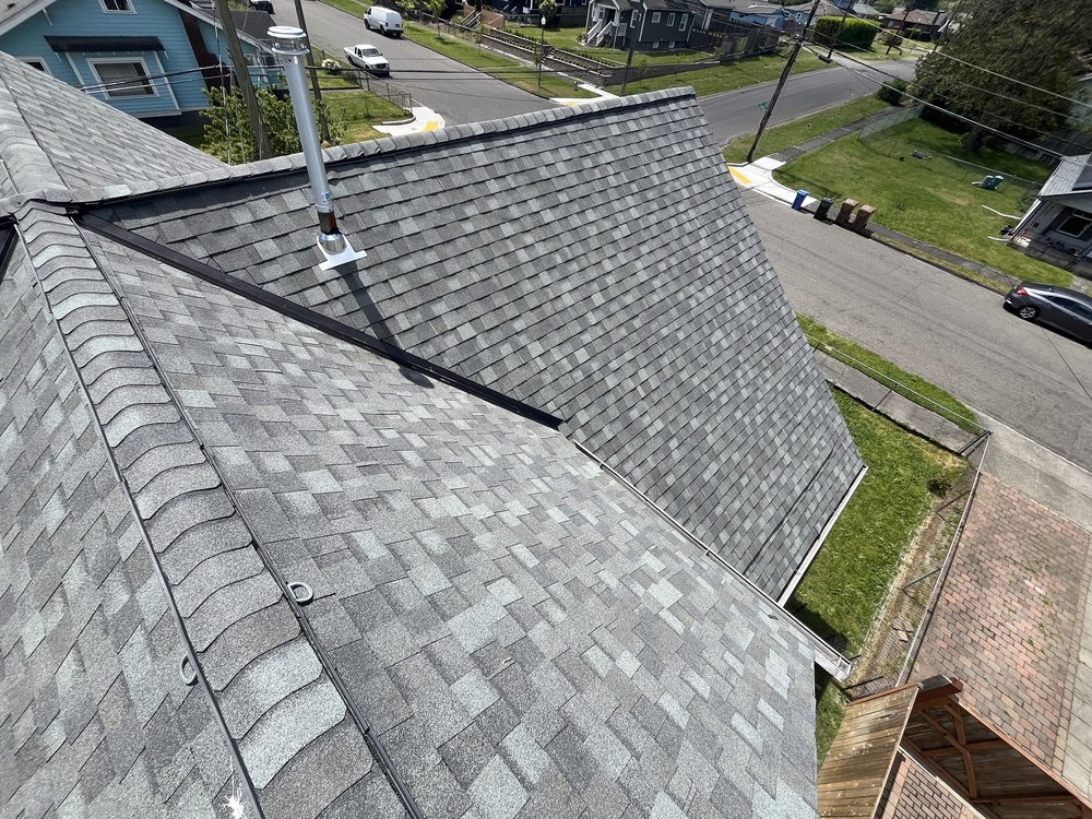 Detailed view of new CertainTeed shingle installation during a Tacoma roof project.