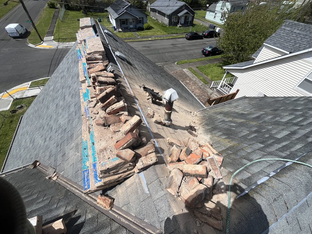 Process of shingle replacement and sub-structure preparation in Tacoma.

