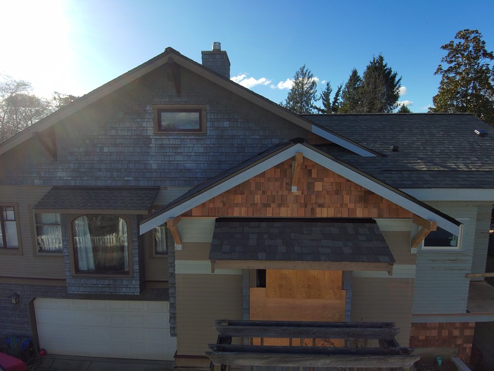 Finished roofing project showing the functionality and appeal of the new shingles