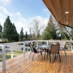 Outdoor home deck built with composite materials by local deck company.