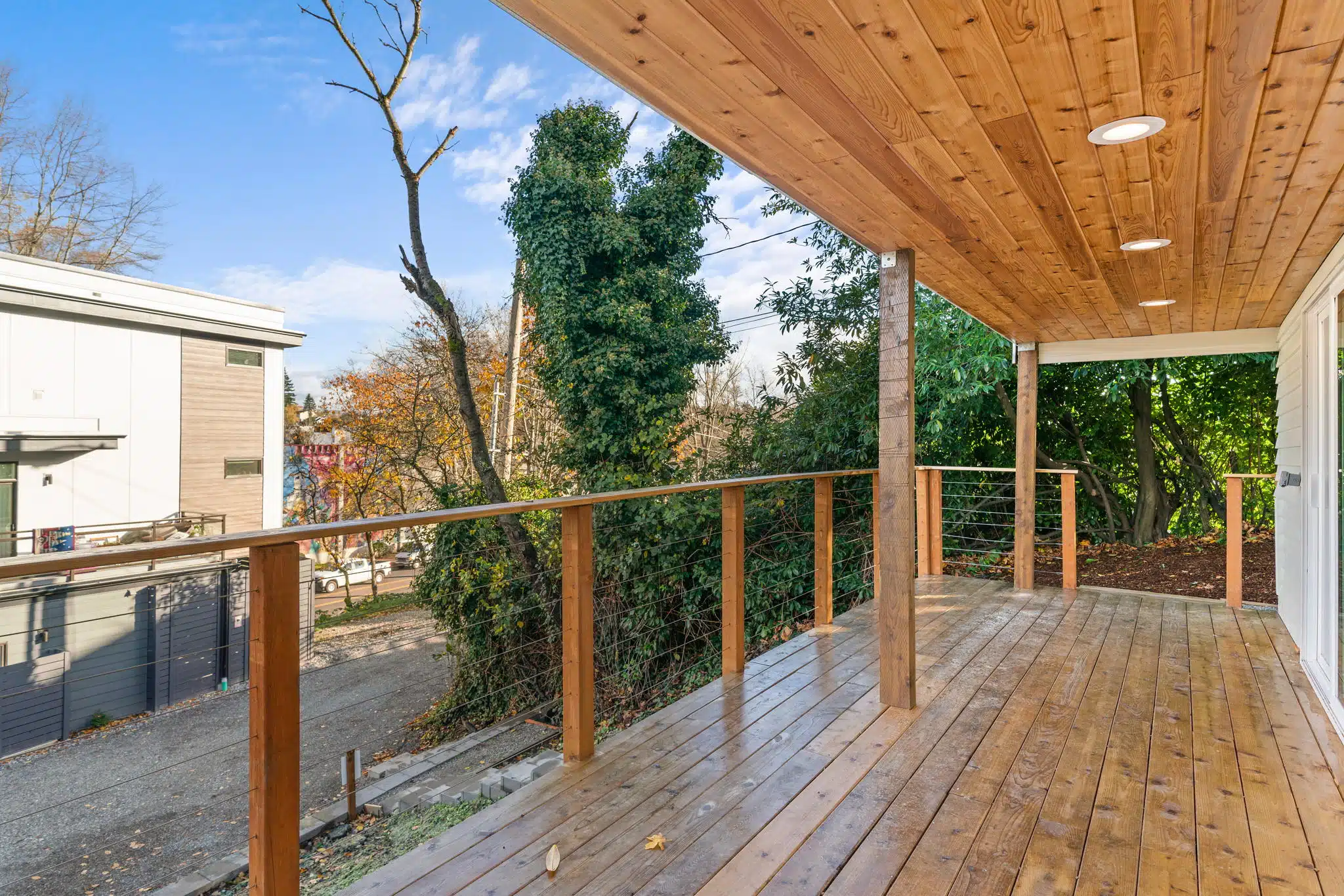 Licensed deck contractor — composite deck installation by Orca Roofing & Exteriors